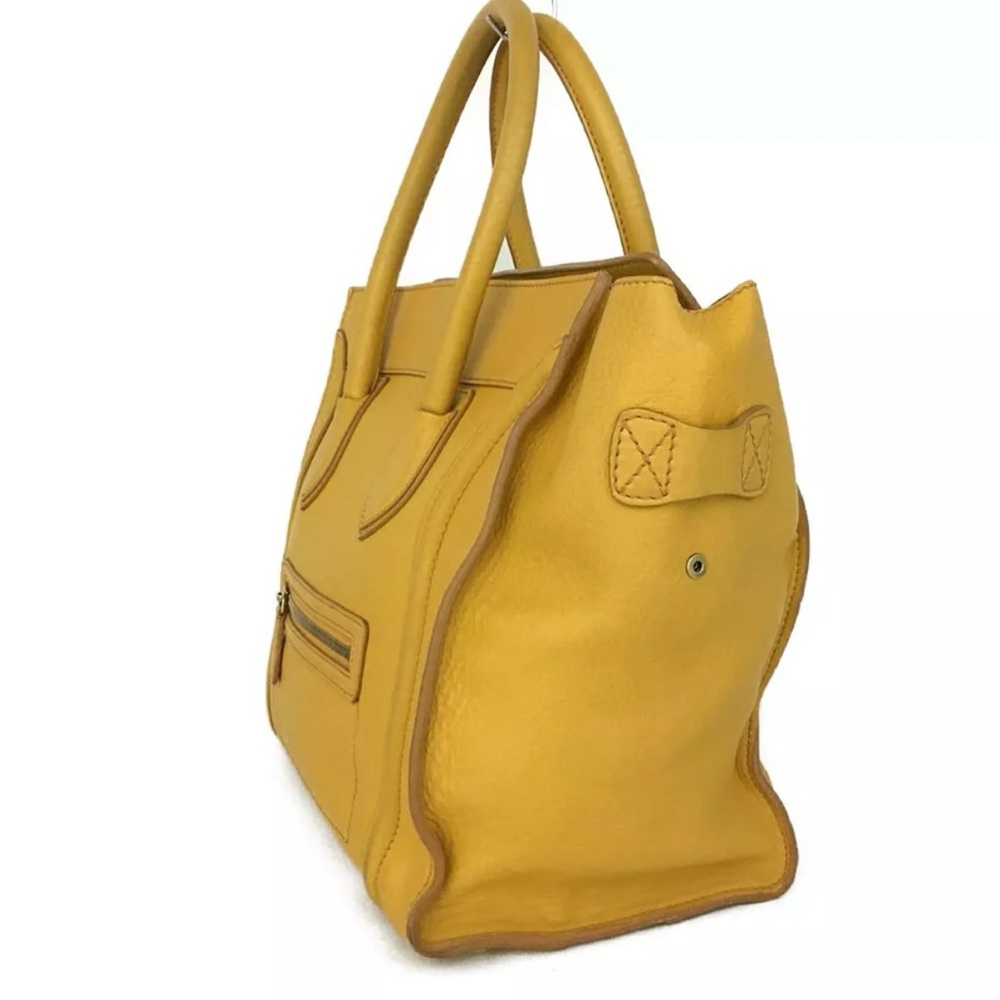 Authentic Micro Luggage Handbag In Drummed Calfskin comes with dustbag. - Picture 10 of 12